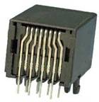 Żeńskie złącze RJ45 z ośmioma stykami, służące do podłączania kabli Ethernet w sieciach komputerowych.