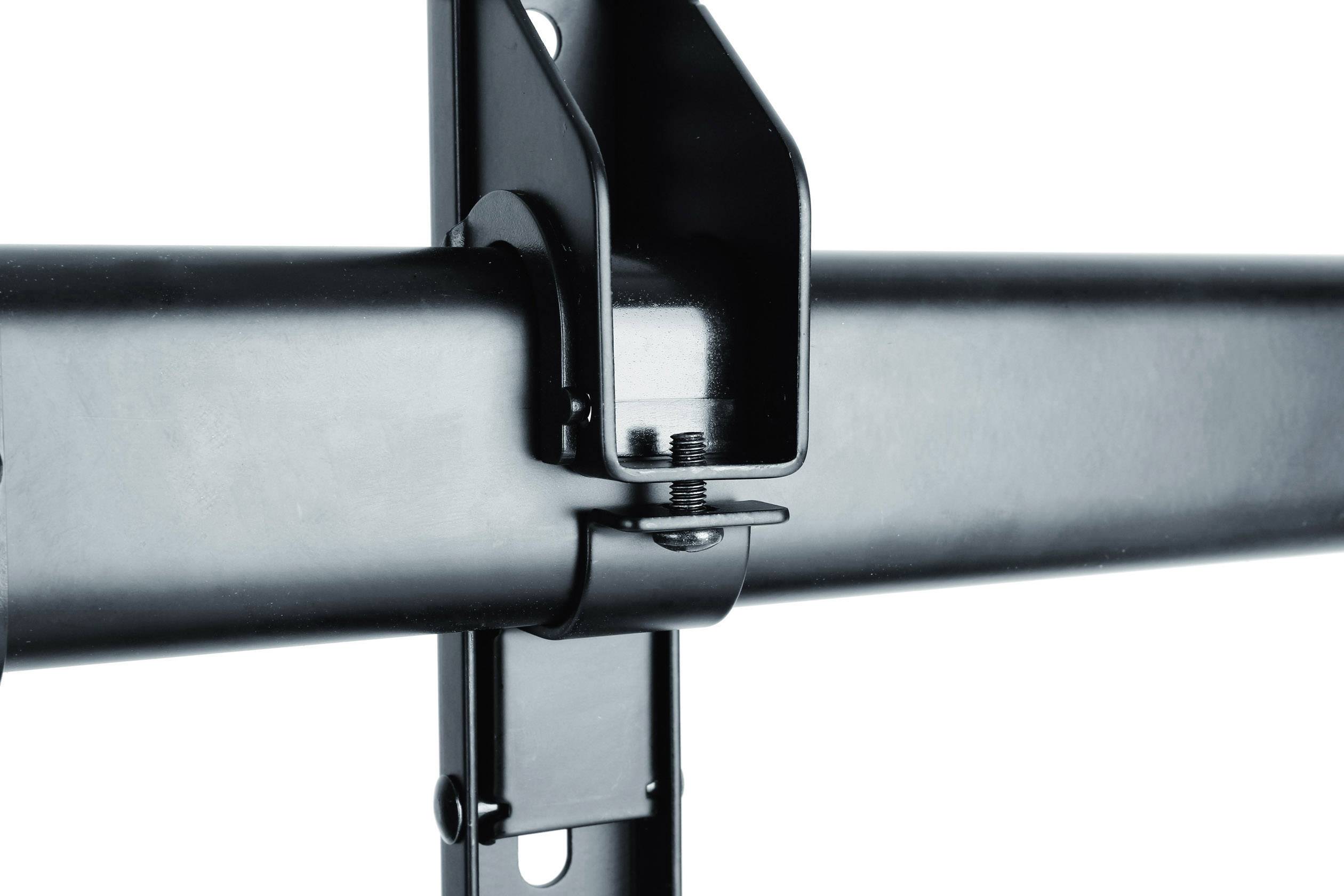 Zbliżenie czarnego metalowego uchwytu z wkrętem pośrodku, łączącego dwie części.