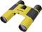 Żółta lornetka z czarnymi akcentami i centralną śrubą ostrości. Idealna do aktywności na świeżym powietrzu, takich jak obserwacja ptaków.