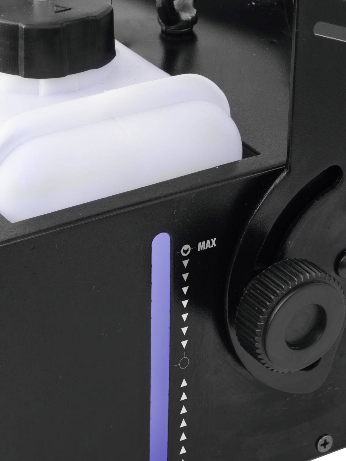 Fragment obrazu przedstawia czarny pojemnik z białym kanistrem i skalą wskazującą poziom napełnienia do 'MAX'.