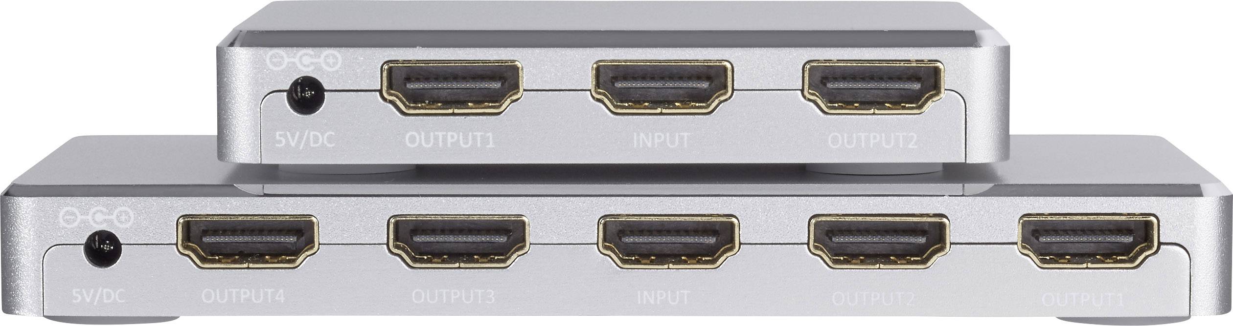 Dwa rozgałęziacze HDMI z wieloma wejściami i wyjściami, ułożone jeden na drugim. Na górze mniejszy rozgałęziacz z trzema złączami.