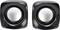 Dwa czarne głośniki z srebrnymi membranami są ustawione obok siebie. Są kompaktowe i mają zaokrąglone krawędzie.