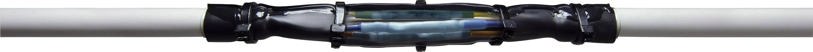 Okrągły łącznik szklany z zamocowaną rurką metalową; dekoracyjny akcent z niebieskimi i żółtymi refleksami w szkle, usytuowany centralnie w kadrze.