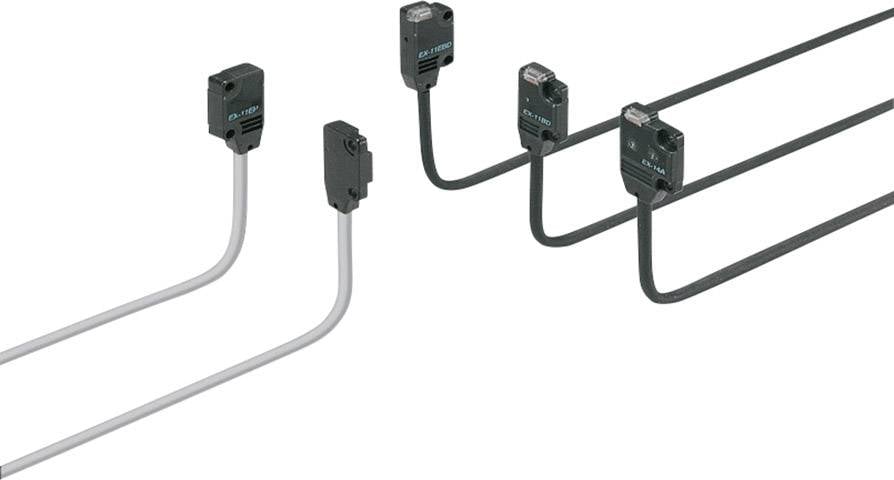 Czujniki ruchu z przewodami, ułożone w dwóch rzędach. Po lewej stronie dwa z jasnymi przewodami, po prawej stronie trzy z ciemnymi przewodami.