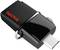 Czarny pendrive SanDisk z mikrołączem USB i kółkiem na klucze.