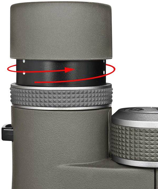 Lornetka z obrotowym pierścieniem dioptrii, podkreślona czerwoną strzałką. Idealna do dostosowania do indywidualnej ostrości widzenia.