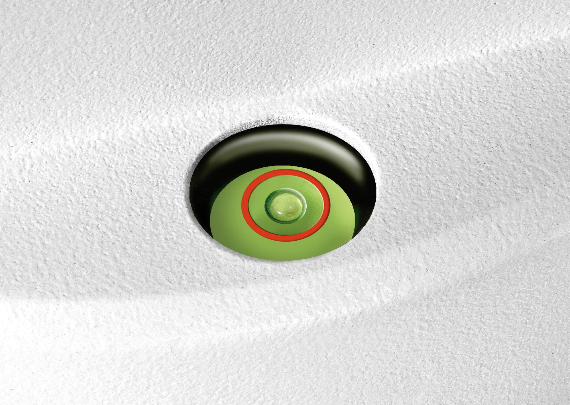 Zielono-czerwona ikona przycisku na szarej strukturze. Przycisk wydaje się być ważny lub gotowy do użycia.