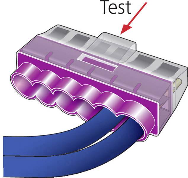 Rysunek złącza z dwoma niebieskimi kablami. Czerwona strzałka i tekst 'Test' wskazują na fragment wtyczki.