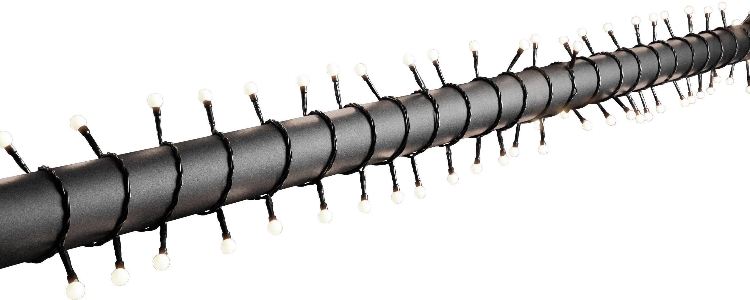 Długa, czarna rura owinięta łańcuchem małych białych świateł, równomiernie rozłożonych wzdłuż całej powierzchni.
