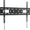 Czarna, płaska metalowa uchwyt ścienny do telewizora z wieloma otworami montażowymi i wbudowanym poziomnikiem pośrodku.