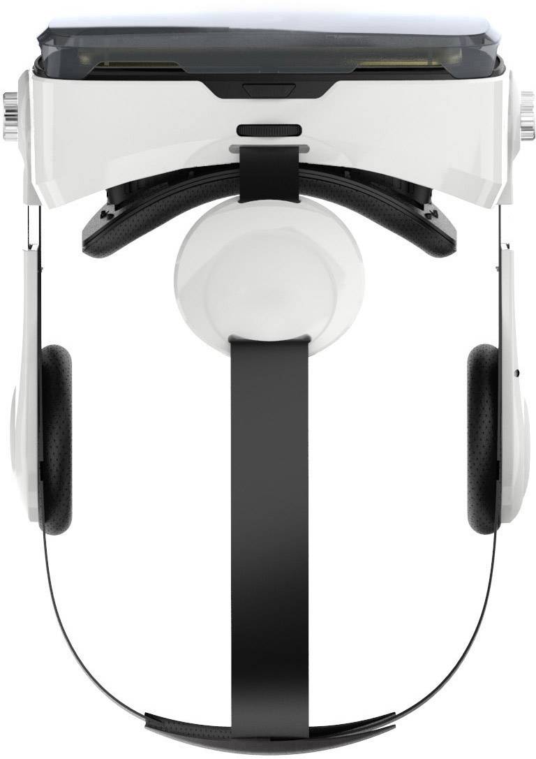 Białe gogle VR. Widok z góry, ukazujący pasek na głowę, nauszniki i wizjer. Urządzenie do immersyjnych doświadczeń wirtualnej rzeczywistości.