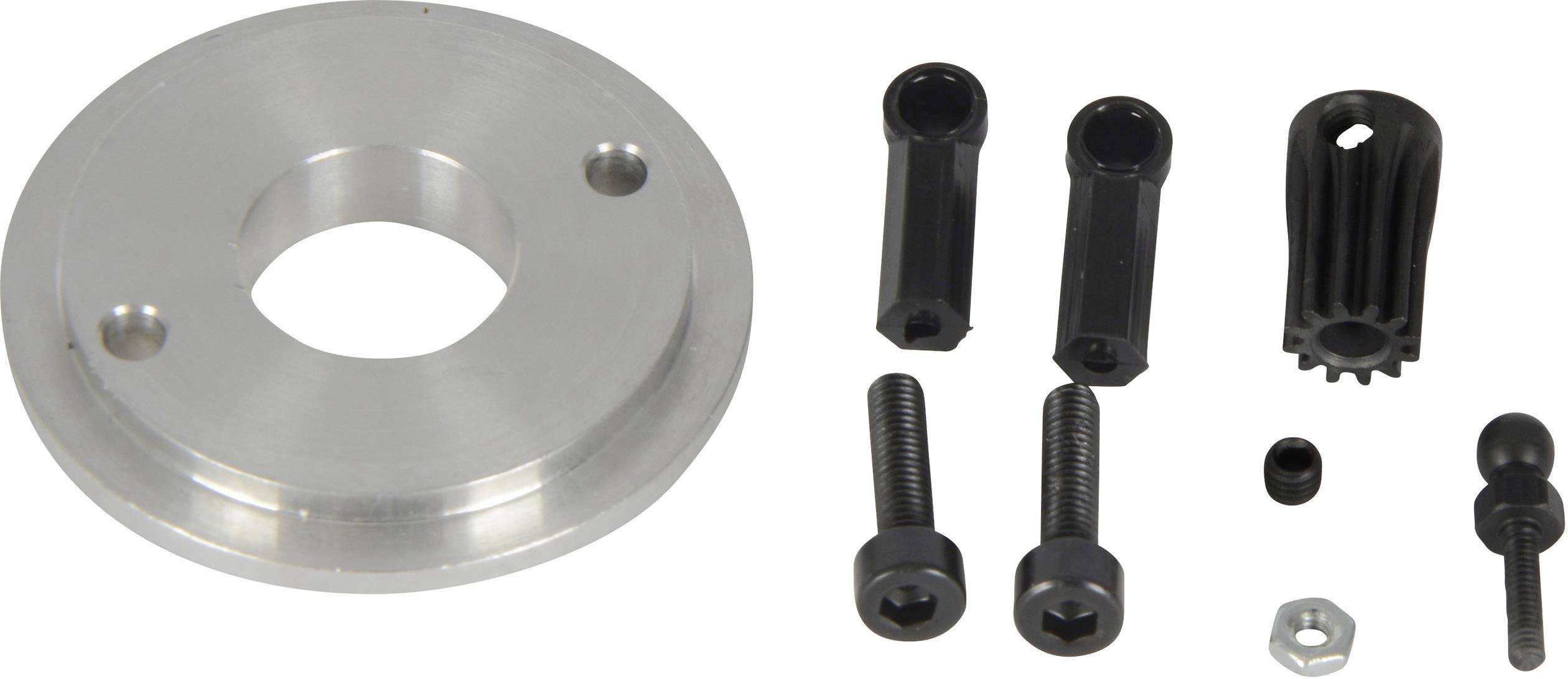 Metalowa płyta z centralnym otworem, czarne śruby, bolce i tuleje, około 10 elementów; zestaw komponentów do montażu lub naprawy.