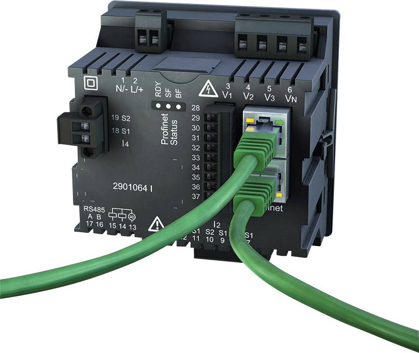 Czarny moduł elektroniczny z wieloma złączami jest podłączony zielonymi kablami. Na wierzchu widoczne są opisy.
