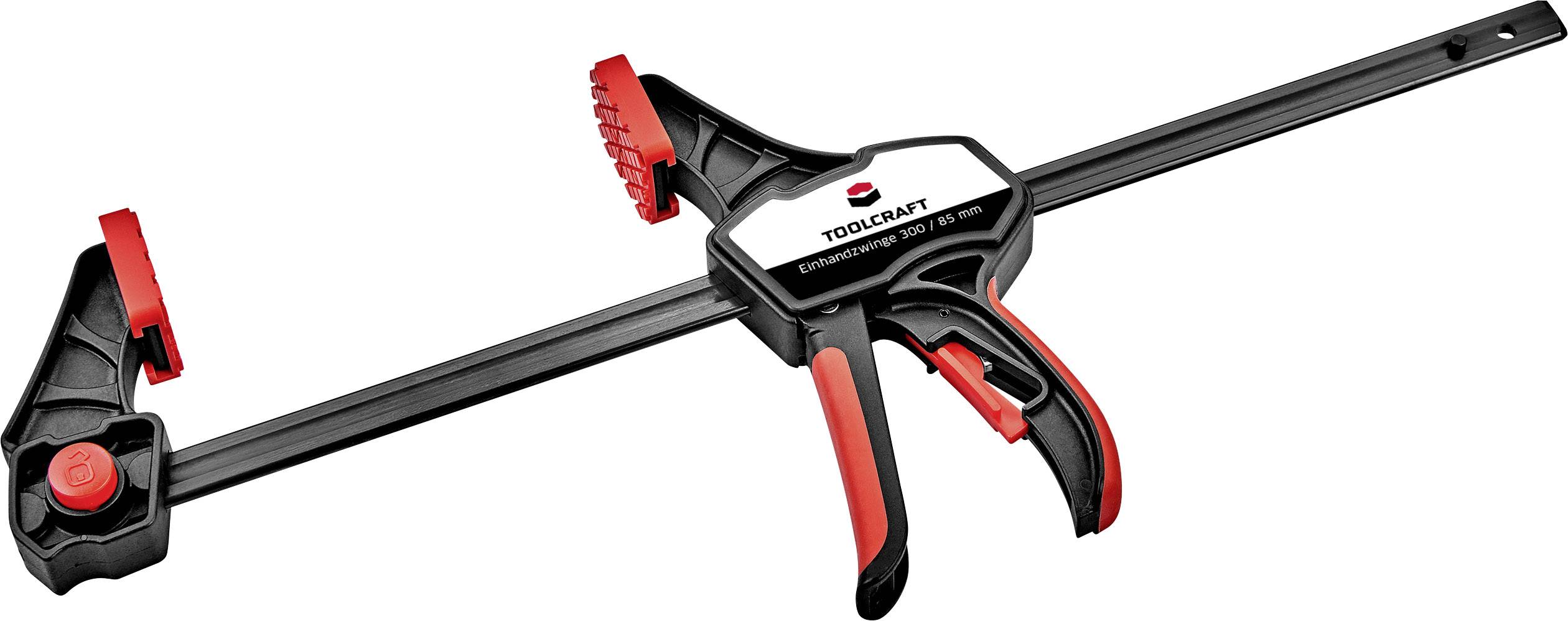 Zacisk narzędziowy z czerwonym i czarnym uchwytem, przydatny do mocowania elementów obrabianych. Etykieta: 'Toolcraft'.