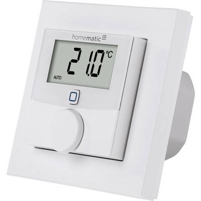 Elektroniczny termostat ścienny wyświetla 21,0°C. Na górze widnieje napis 'homematic'. Widoczny jest obrotowy pokrętło do regulacji temperatury.