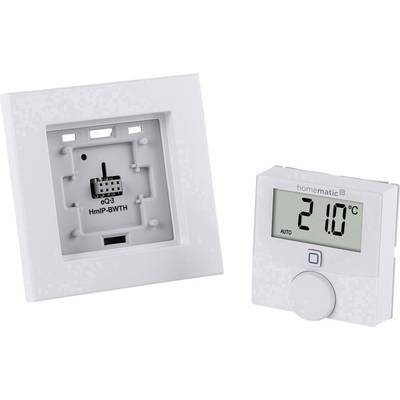 Dwie części termostatu grzewczego: Po lewej stronie płytka montażowa do instalacji, po prawej wyświetlacz pokazujący '21,0°C', poniżej pokrętło regulacyjne.