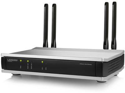 Router Wi-Fi z dwiema antenami na białej powierzchni. Widoczne są trzy diody kontrolne oraz kilka złączy.