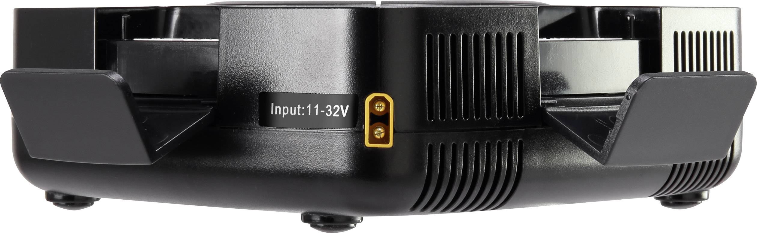 Czarne urządzenie z dwoma zaokrąglonymi ramionami skierowanymi do przodu i napisem 'Input: 11.32V' pośrodku.