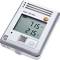Cyfrowy miernik z wyświetlaczem pokazuje '715 ppm' i '21,5 °C'. Na górze widnieje napis 'testo 160 IAQ'. Na dole znajduje się kod QR.