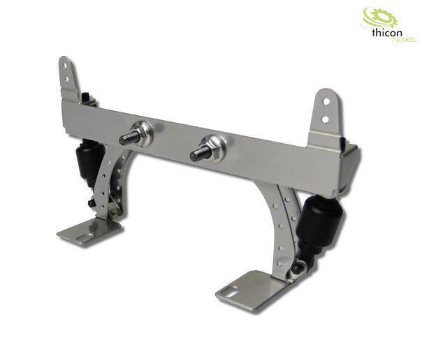 Szczegółowa metalowa rama modelarska z dwoma amortyzatorami i uchwytami, stosowana w modelach technicznych lub mechanicznych.