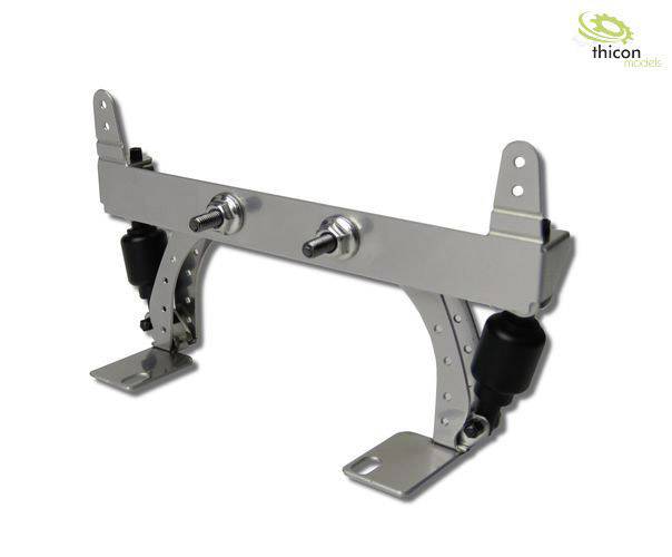 Metalowa konstrukcja z systemem sprężynowym, odpowiednia do modelarstwa; charakteryzuje się solidną budową z precyzyjnymi detalami.