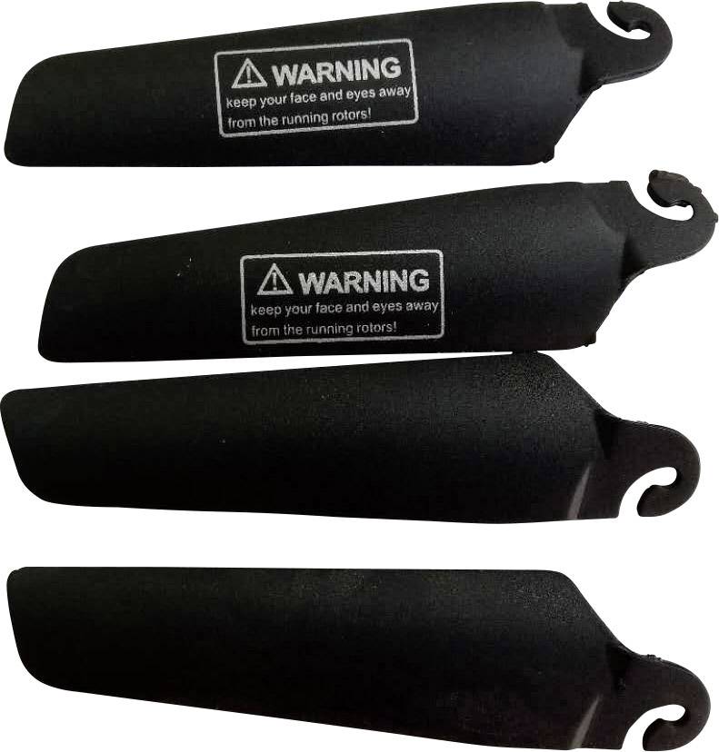 Cztery czarne łopaty wirnika z ostrzeżeniem: 'UWAGA: Trzymać twarz i oczy z dala od obracających się wirników'.