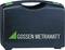 Czarny kufer z zielonym trójkątem i białym napisem 'GOSSEN METRAWATT', prawdopodobnie do przechowywania przyrządów pomiarowych.