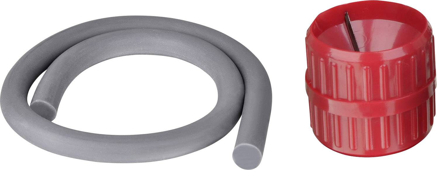 Szara rolka uszczelniająca obok czerwonej temperówki do ołówków.