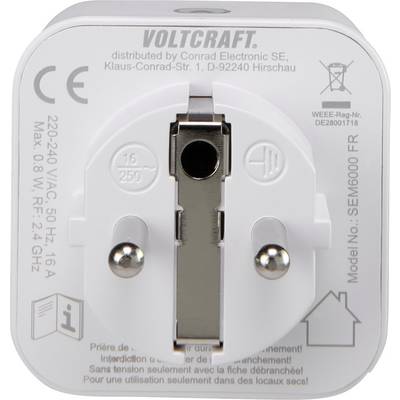 Biały adapter firmy Voltcraft z danymi technicznymi i numerem modelu na przedniej stronie. Styki wtykowe pośrodku.