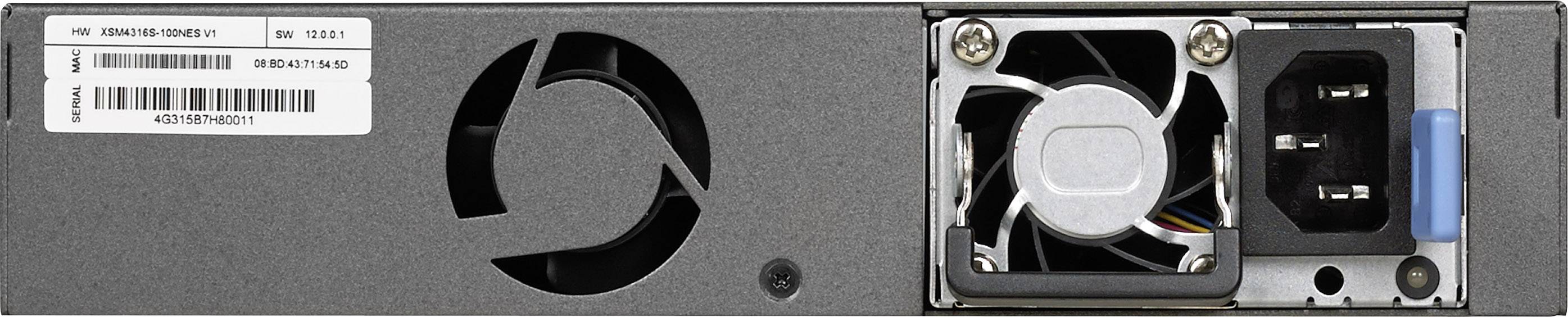 Zbliżenie zasilacza komputerowego z wentylatorem, trójstykowym złączem zasilania i naklejkami.