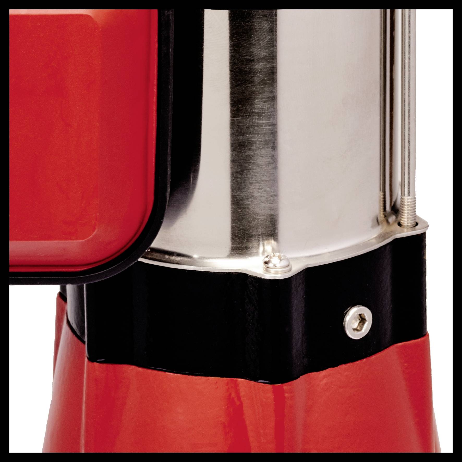 Wycinek struktury metalowej w kolorach czerwonym i czarnym z elementami srebrnymi, prawdopodobnie będący częścią urządzenia lub maszyny.