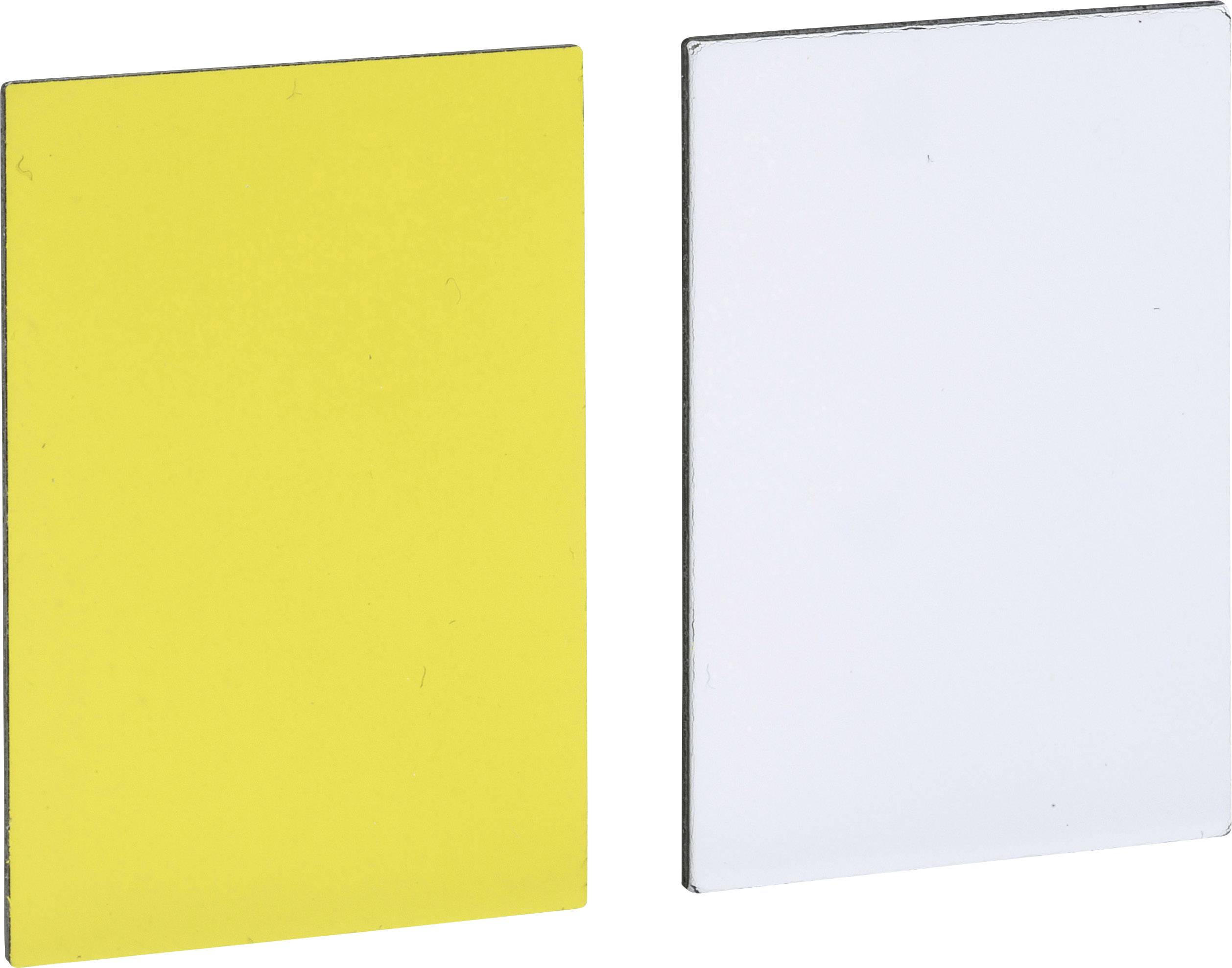 Dwie prostokątne płyty obok siebie: Po lewej żółty, po prawej biały prostokąt.