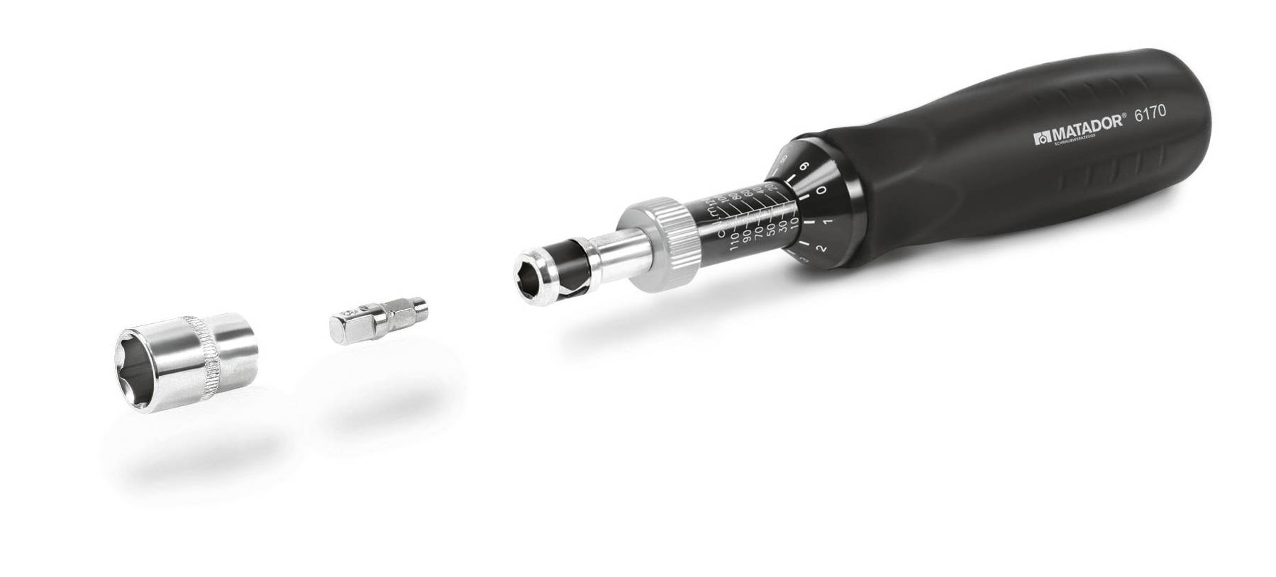 Klucz dynamometryczny z wymiennymi końcówkami, czarny, po lewej stronie obrazka dwa metalowe elementy.