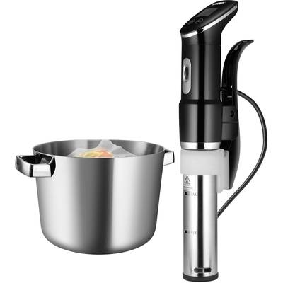Termometr do sous-vide tkwi w garnku z wodą, w którym gotują się próżniowo zapakowane produkty spożywcze. Urządzenie wyświetla cyfrowy odczyt temperatury.