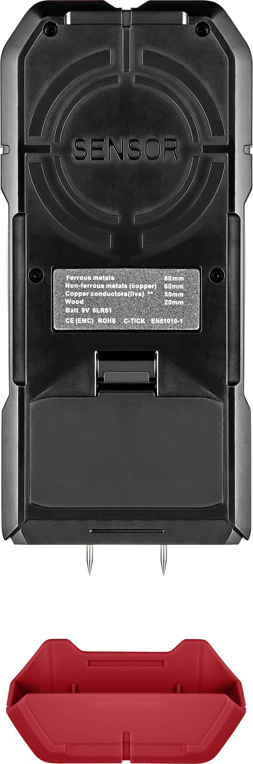 Czarny elektroniczny sprzęt z czujnikiem w obudowie, leży na czerwonym elemencie.