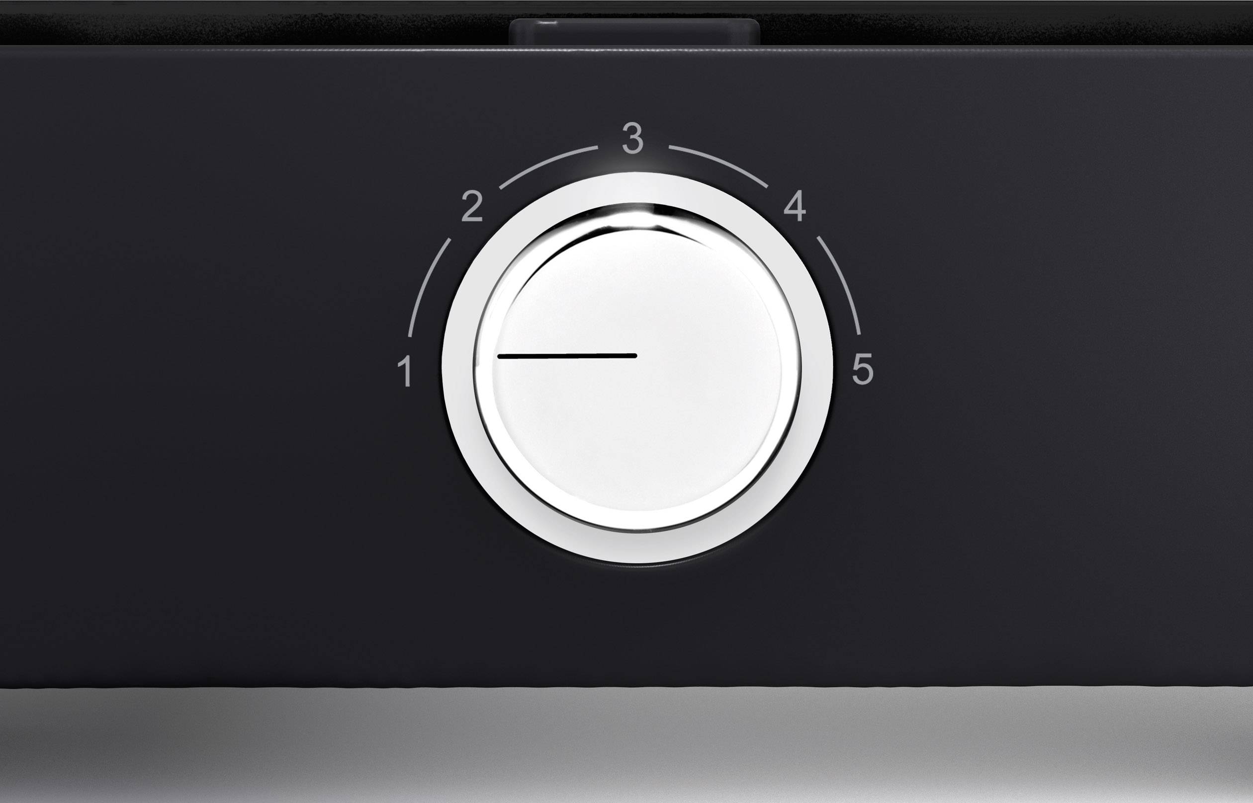 Pokrętło na urządzeniu ustawione na poziom 3 z 5 możliwych poziomów.