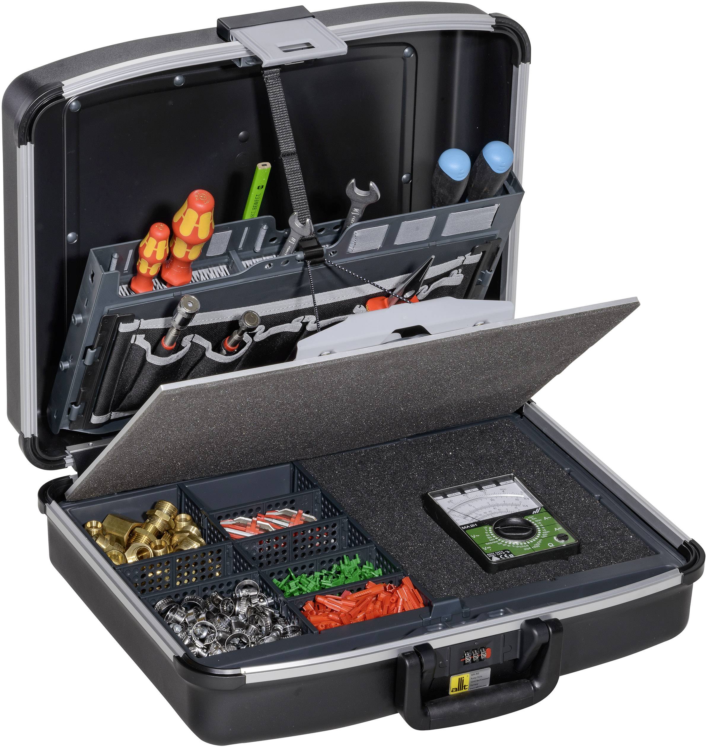 Otwarty kufer narzędziowy prezentuje różne śrubokręty, szczypce i drobne elementy w oddzielnych przegródkach. Na dnie walizki leży przyrząd pomiarowy.
