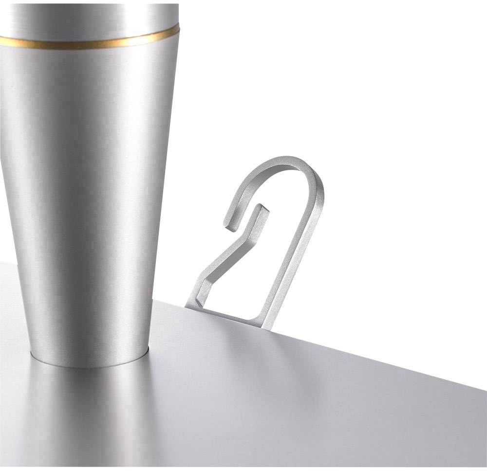 Srebrny stożkowaty kielich stoi na blacie stołu. Obok widoczny jest hak zamocowany na krawędzi stołu.