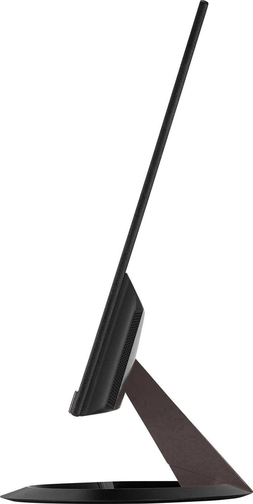 Ultracieniki monitor z profilu, prezentujący elegancki, nowoczesny design ze stabilną podstawą. Idealny do biur i stanowisk roboczych oszczędzających przestrzeń.