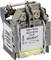 Elektryczny element z napisem '525V 50Hz, 600V 60Hz, 10VA, MX/SHT' na etykiecie. Dwie zaciski na górze, białe przewody na dole.