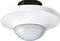Biały, okrągły czujnik ruchu z wypukłym elementem optycznym pośrodku.