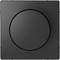 Czarny, kwadratowy włącznik światła z okrągłym pokrętłem pośrodku.