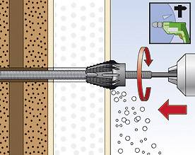 Ilustracja wiertła podczas wiercenia przez ścianę z ruchem obrotowym i wypadającymi kawałkami muru. Symbol przedstawia wiertarkę.