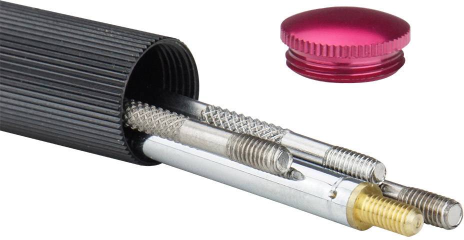 Czarne pudełko narzędziowe zawierające kilka metalowych końcówek oraz wypukłą, czerwoną pokrywę.