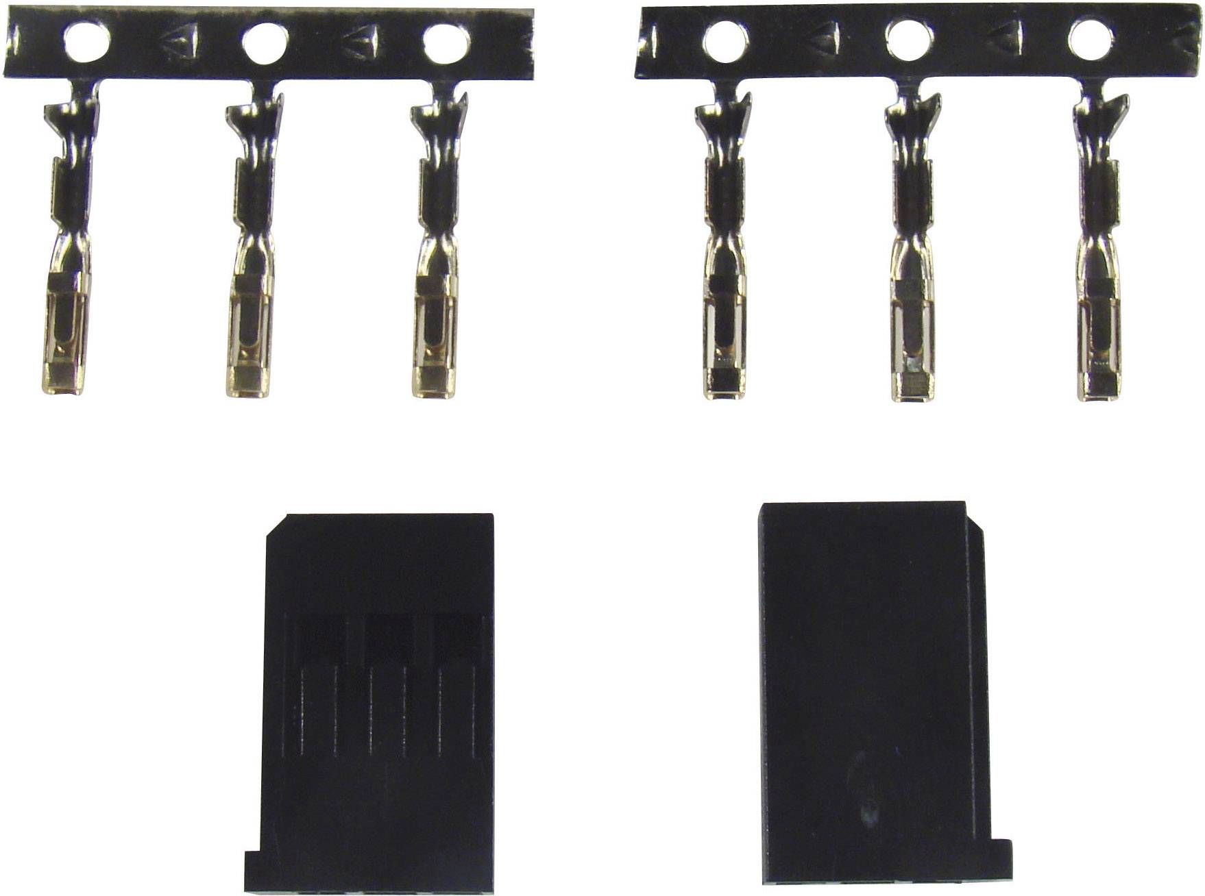 Cztery metalowe styki na górze, dwa czarne wtyczki z tworzywa sztucznego na dole. Elementy do elektrycznych połączeń wtykowych.