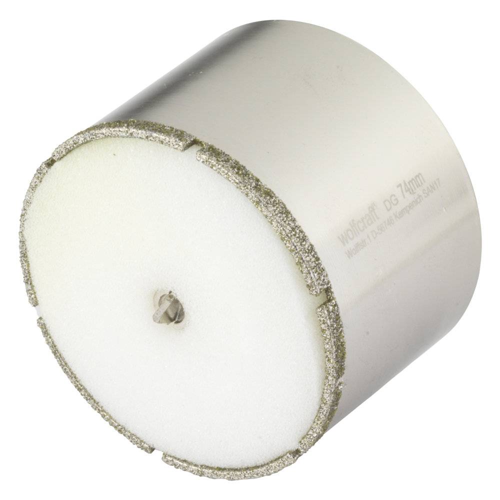 Diamentowa korona wiertnicza metalowa o średnicy 74 mm.