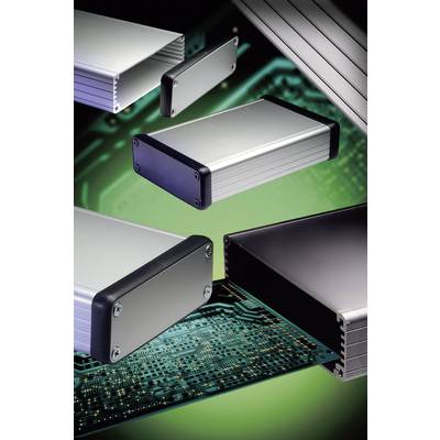 Kilka aluminiowych obudów unosi się nad zieloną płytką drukowaną, symbolizując technologię elektroniczną i rozwiązania obudowowe.