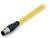 Żółty kabel połączeniowy z czarnym złączem, odpowiedni do zastosowań przemysłowych.