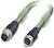 Zielony kabel połączeniowy z czarnymi, okrągłymi wtyczkami na obu końcach, odpowiedni do zastosowań przemysłowych.