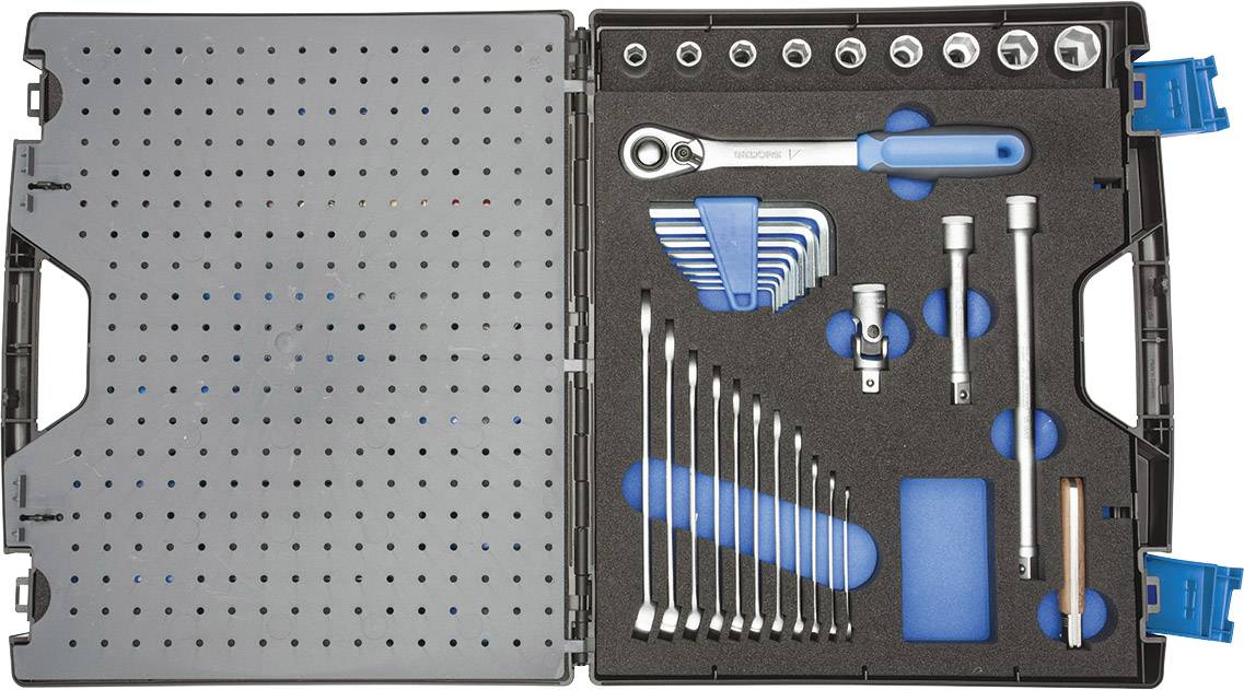 Otwarty kufer narzędziowy z posortowanymi narzędziami, takimi jak klucze płaskie, nasadowe i imbusowe, ułożonymi na pianowej wkładce.